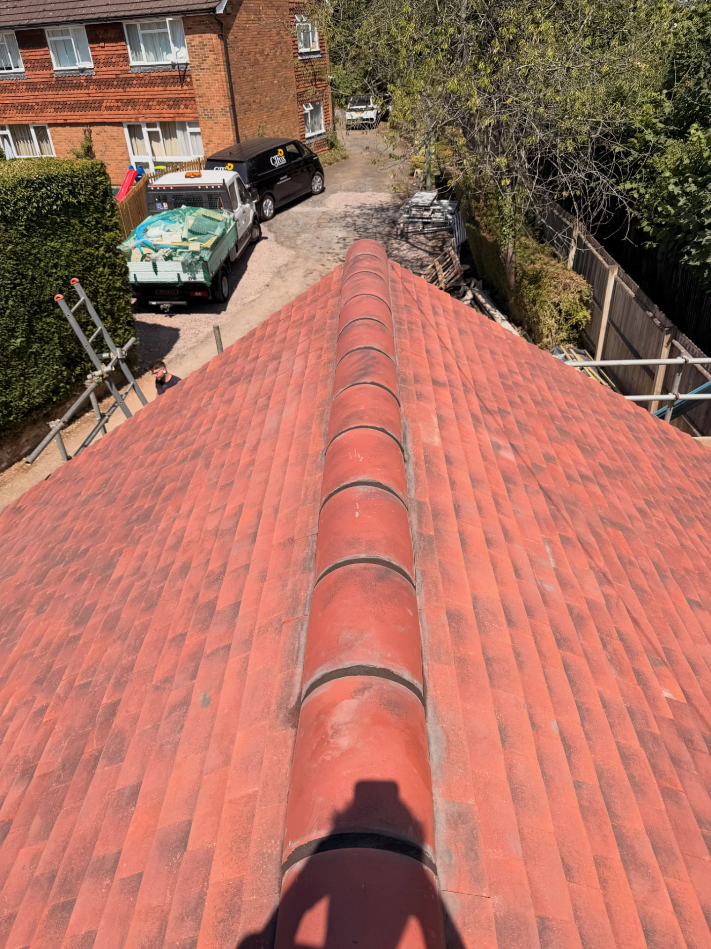 Ridge line of a completed clay tiled roof in Berkshire